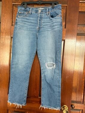 Levi's Light Blue High-Rise Cropped Jeans with Distressed Knee